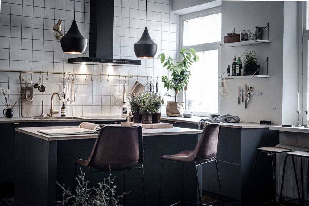 Swedish apartment with dark floor styled by Emma Hos