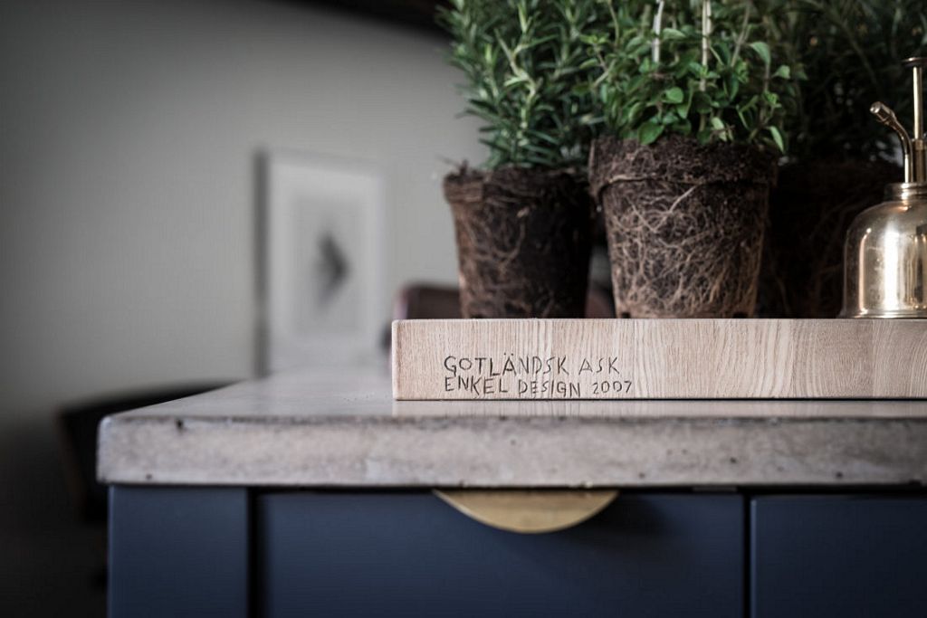 Swedish apartment with dark floor styled by Emma Hos