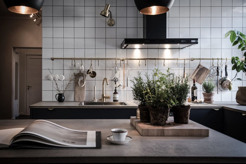 Swedish apartment with dark floor styled by Emma Hos