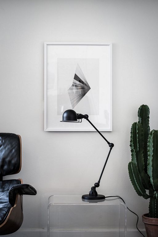 Swedish apartment with dark floor styled by Emma Hos