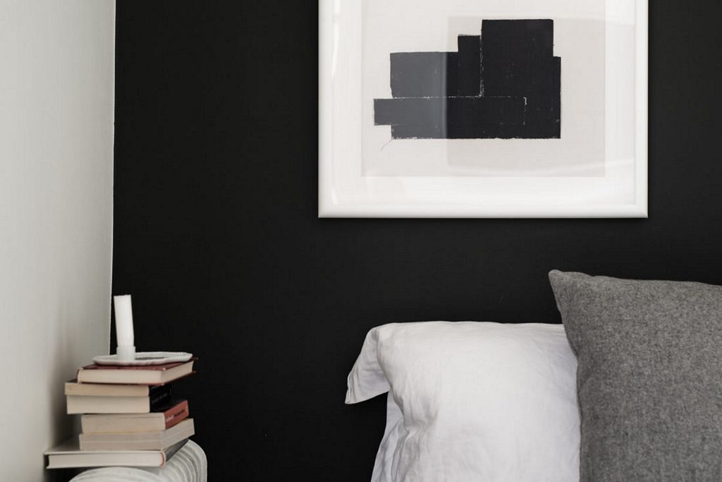 Swedish apartment with dark floor styled by Emma Hos