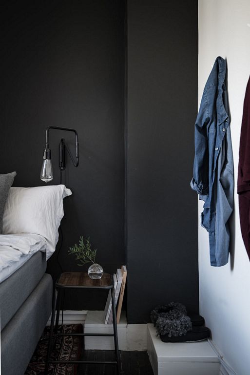 Swedish apartment with dark floor styled by Emma Hos