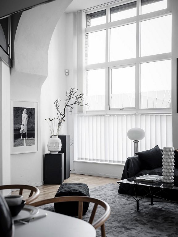 An eclectic studio in black and white hues