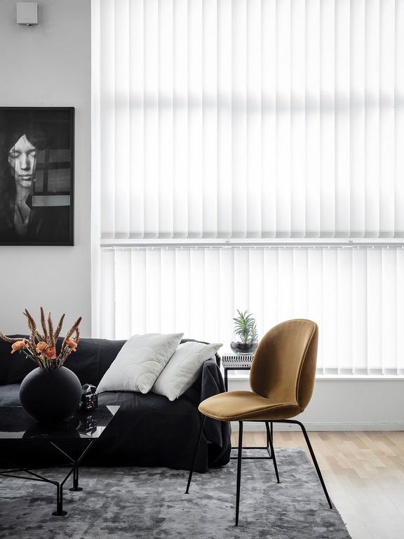 An eclectic studio in black and white hues