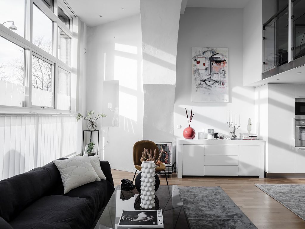 An eclectic studio in black and white hues