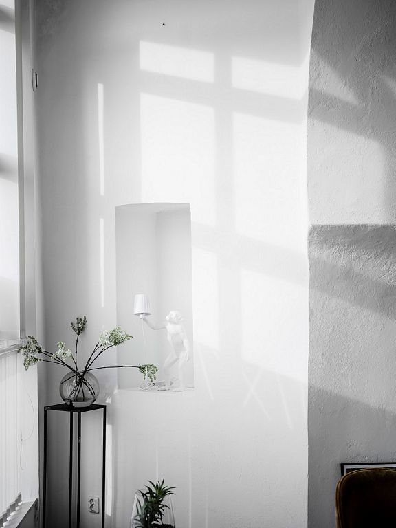 An eclectic studio in black and white hues