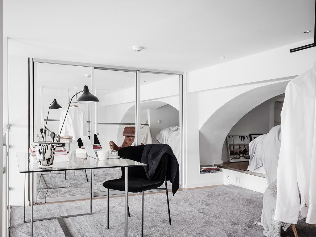 An eclectic studio in black and white hues