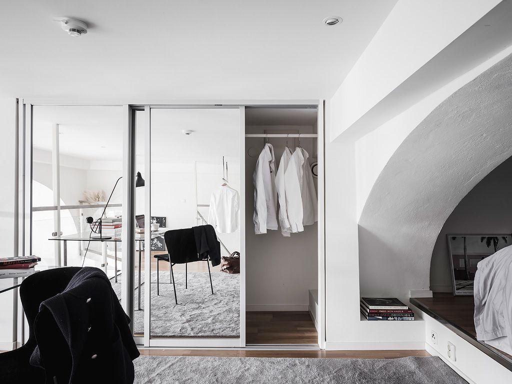 An eclectic studio in black and white hues