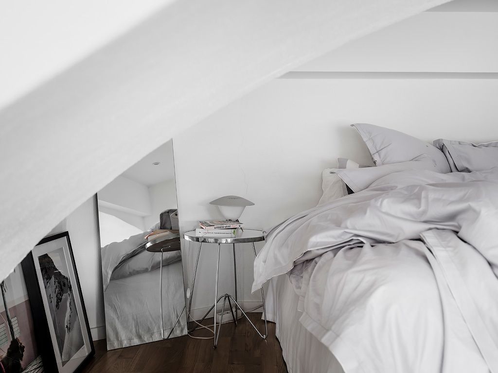 An eclectic studio in black and white hues