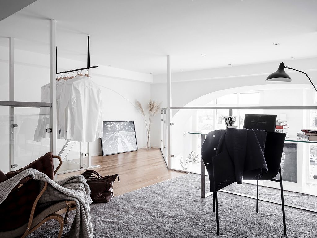 An eclectic studio in black and white hues