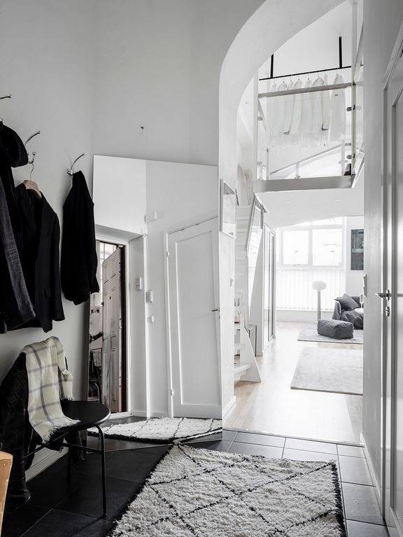 An eclectic studio in black and white hues