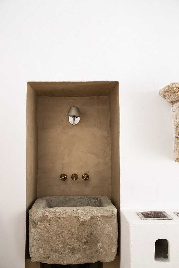 Renovation project of a historic building in Patu by Luca Zanaroli Architects