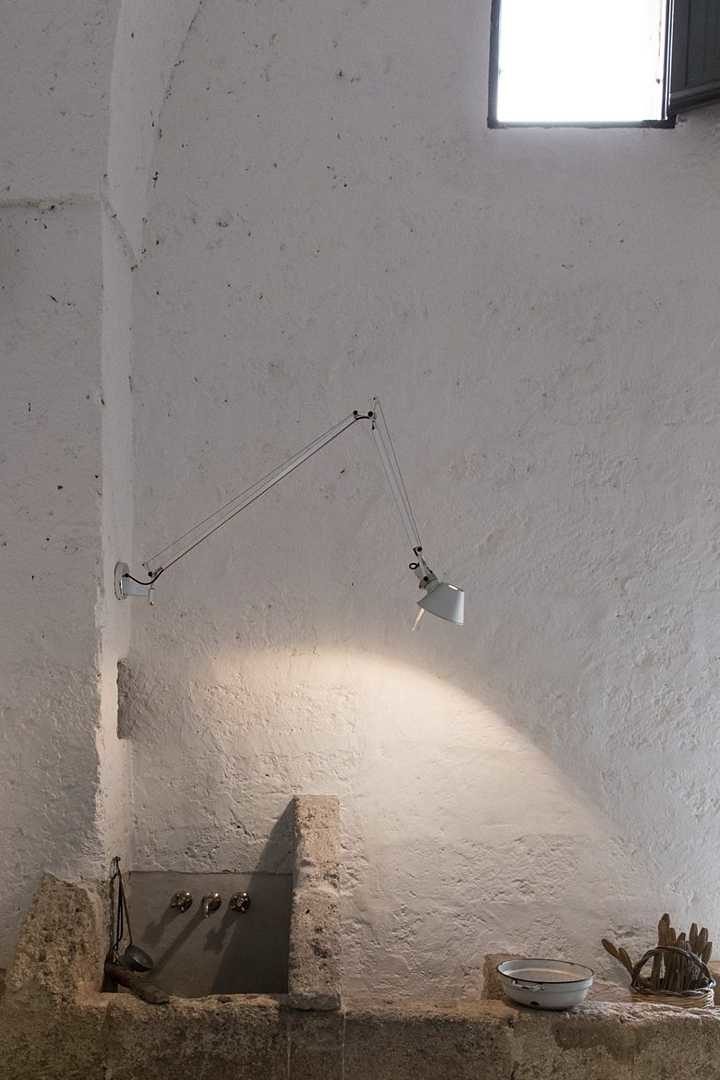 Renovation project of a historic building in Patu by Luca Zanaroli Architects
