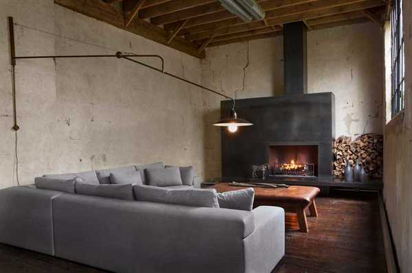 A charcoal factory transformed into a residential loft by Michael Del Piero