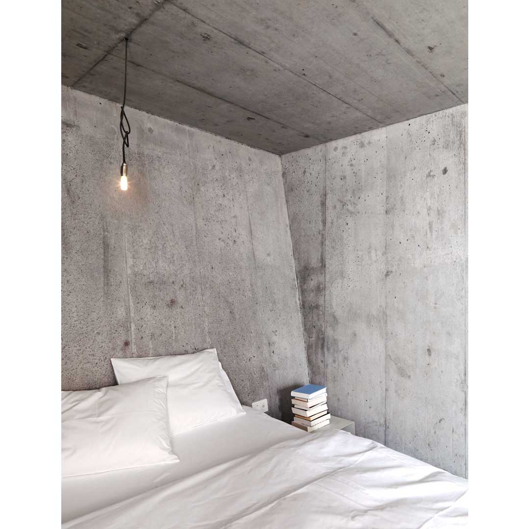 Concrete House by Nickisch Sano Walder Architects