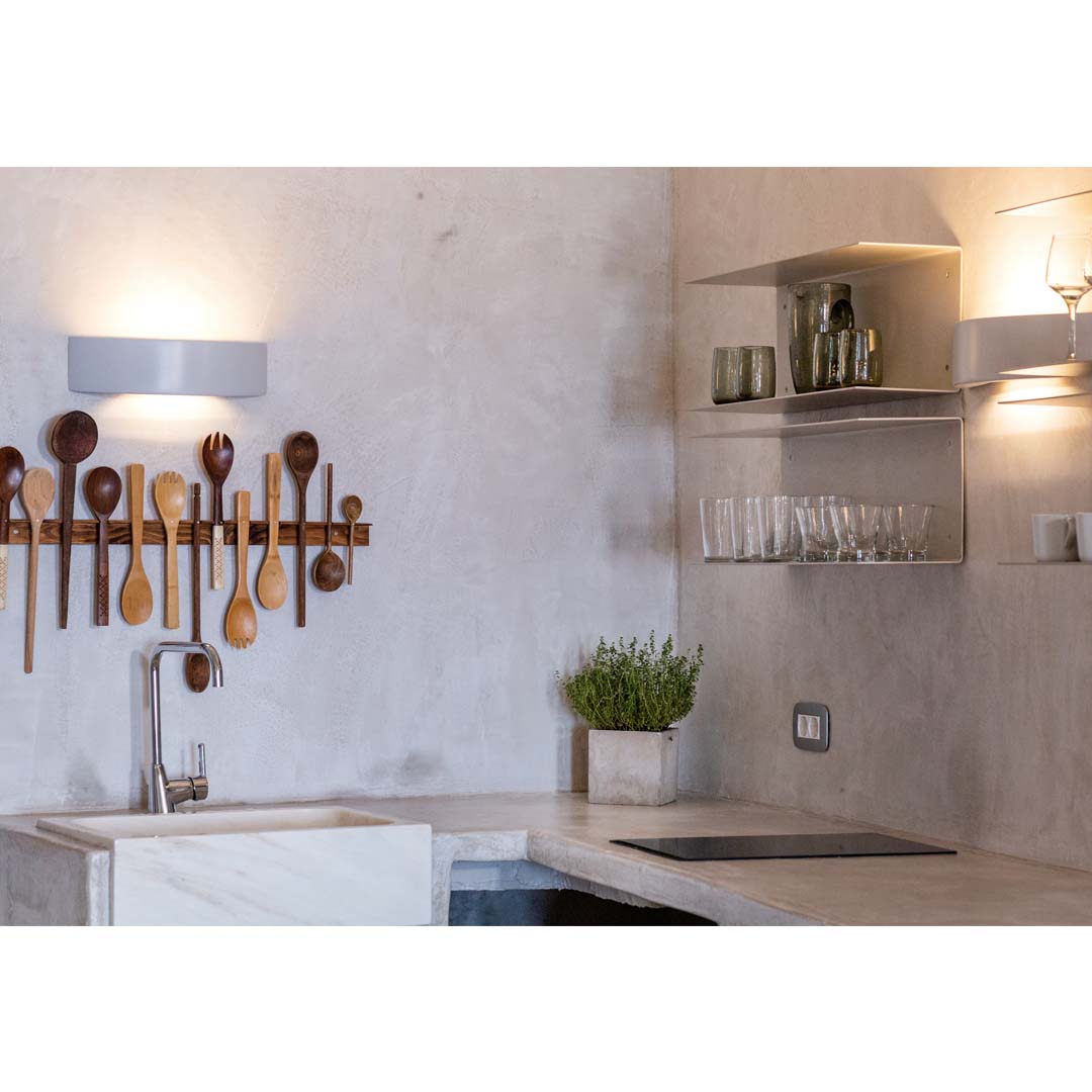 “The Marble Sun” villa in Oia, Santorini by Lime Deco