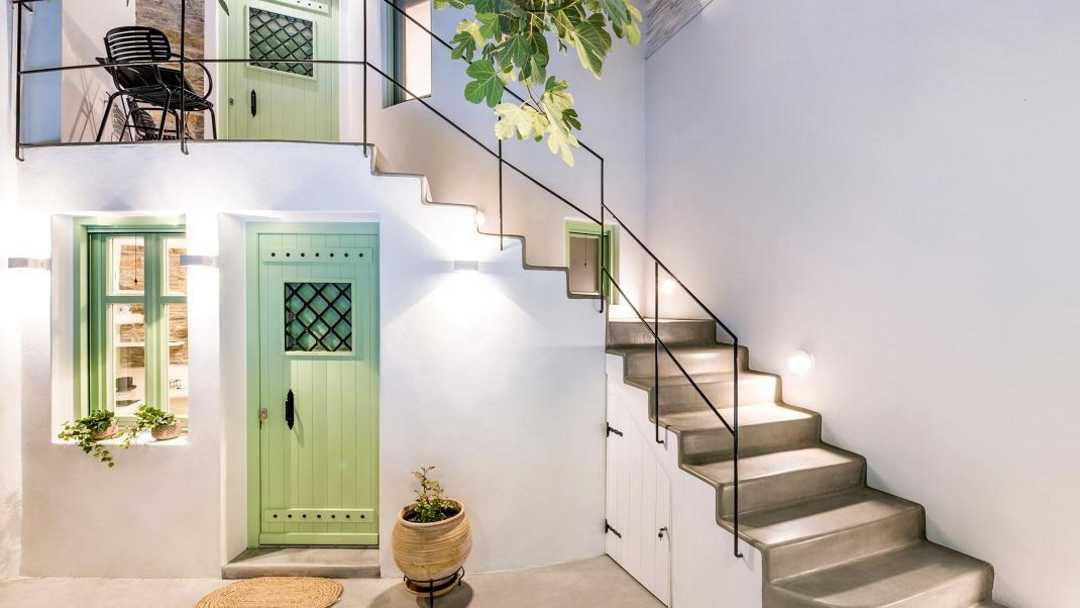 A House of '50s in Andros by Domitech Construction