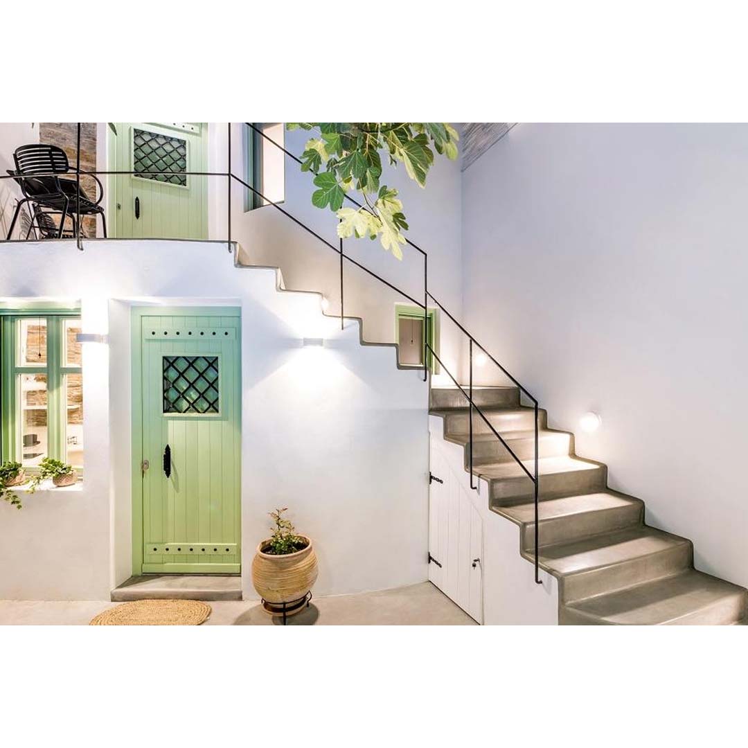 A House of '50s in Andros by Domitech Construction