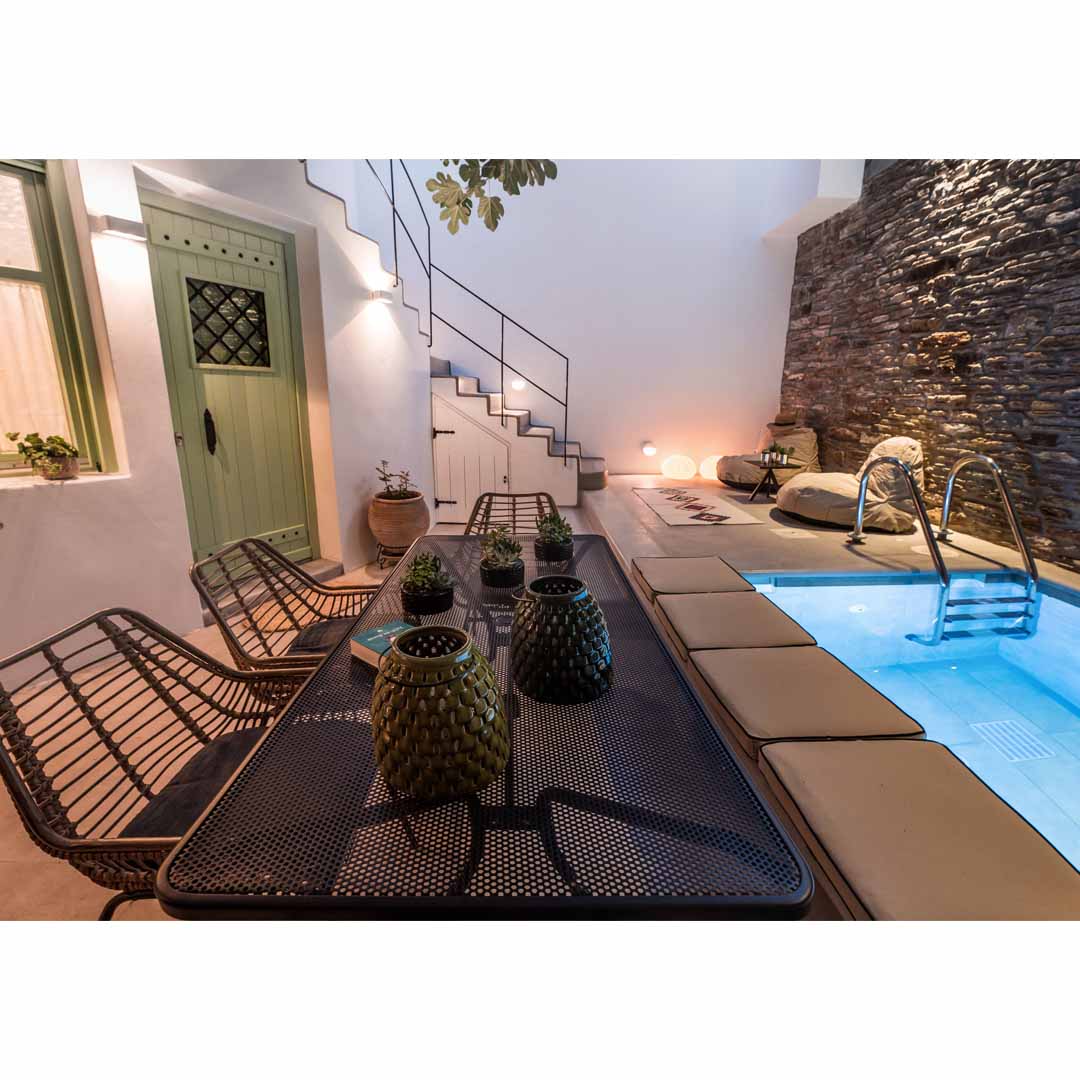 A House of '50s in Andros by Domitech Construction