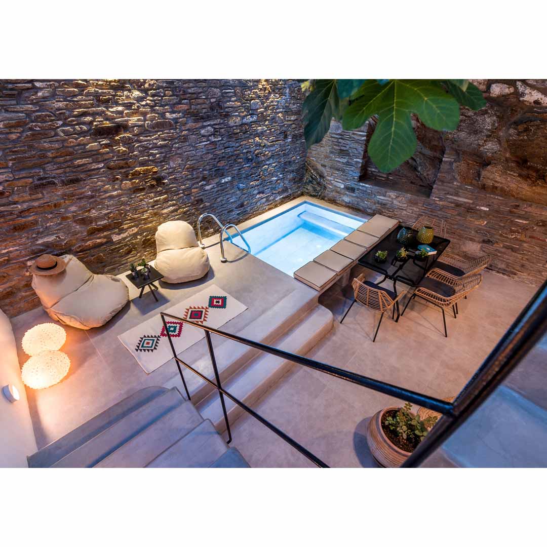 A House of '50s in Andros by Domitech Construction