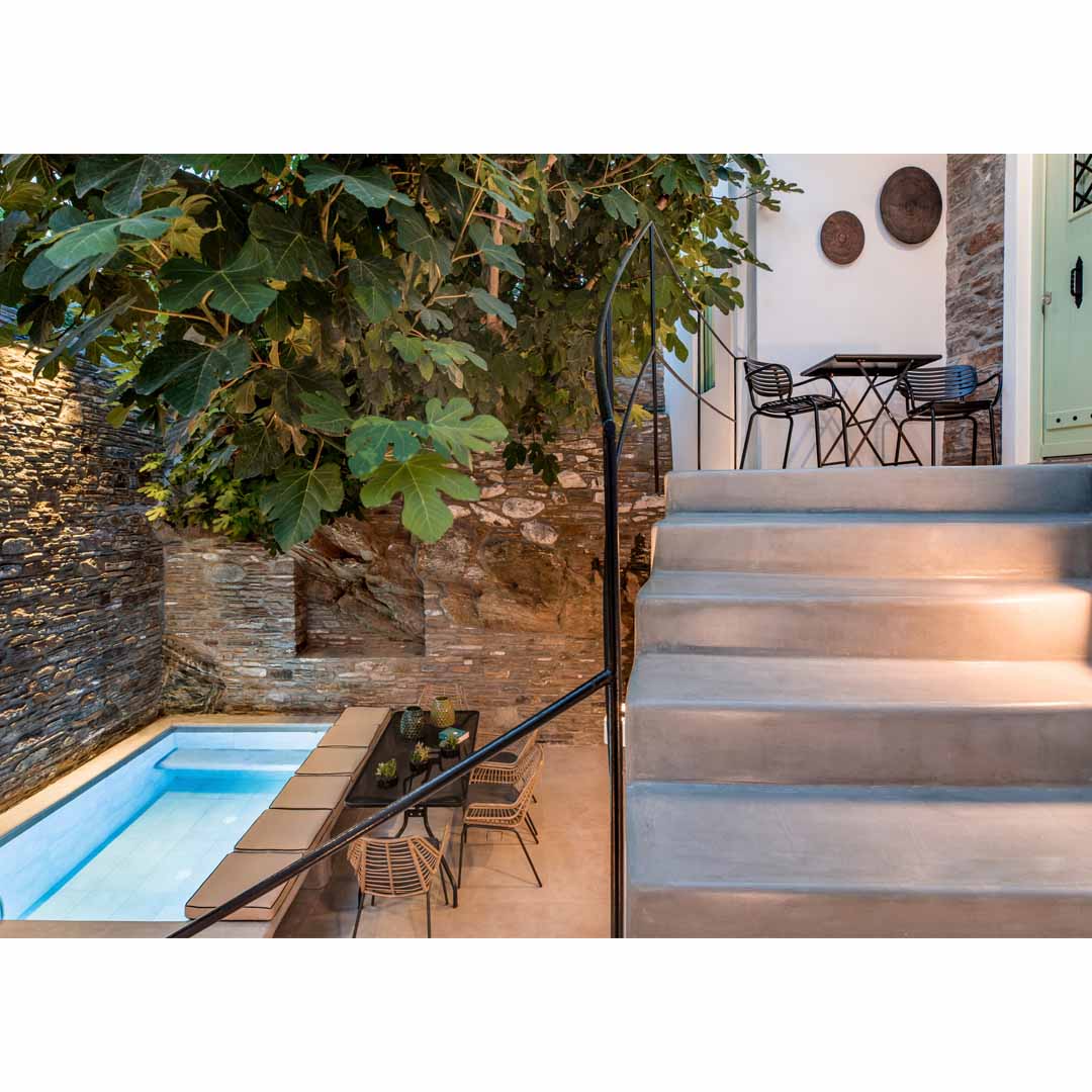 A House of '50s in Andros by Domitech Construction