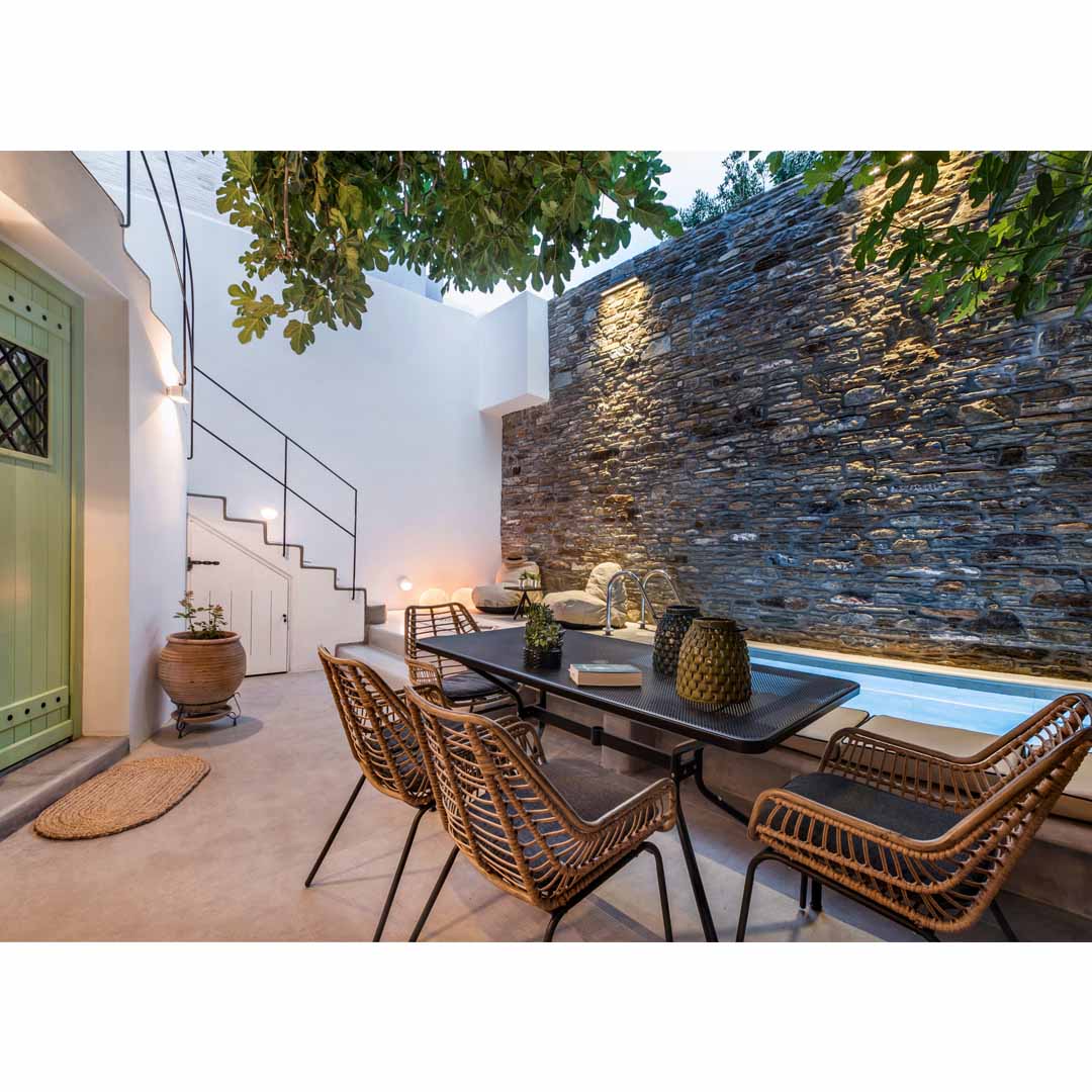 A House of '50s in Andros by Domitech Construction