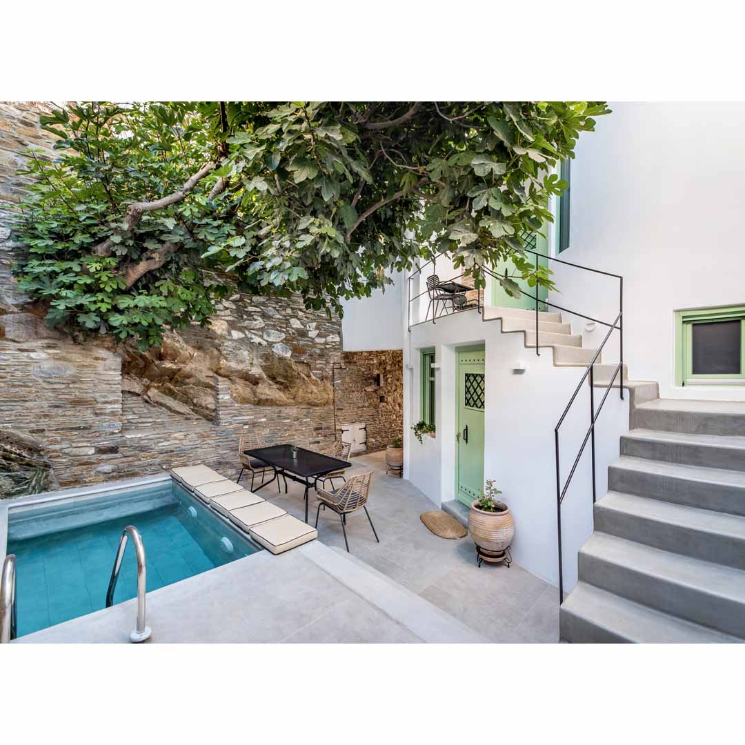 A House of '50s in Andros by Domitech Construction